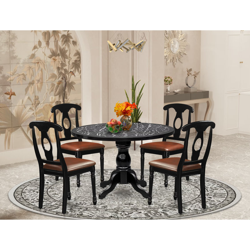 L'ensemble de table de cuisine 5 pièces comprend une table de petit-déjeuner sur piédestal et 4 chaises de salle à manger modernes à dossier Napoléon, finition noire.