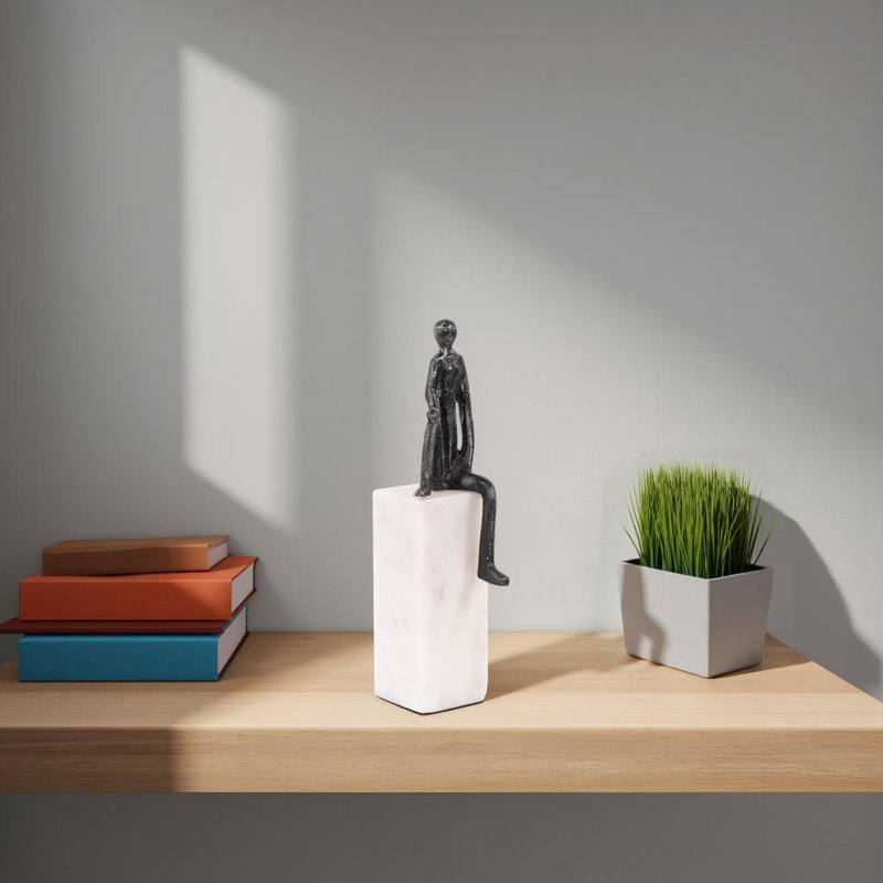 Fogle Sculpture on White Marble Base