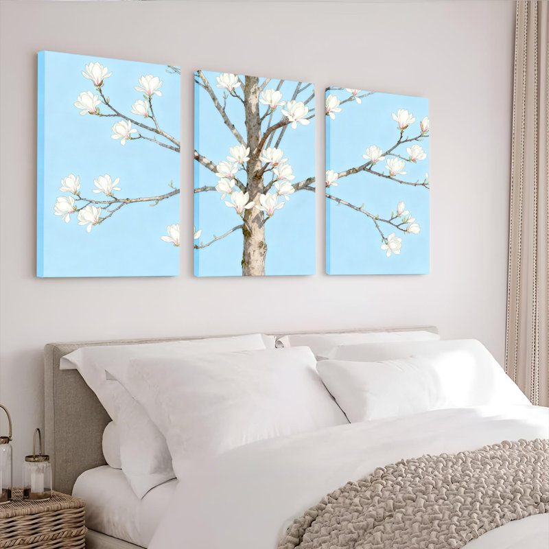 Ensemble de 3 tableaux sur toile tendue représentant un magnolia en fleurs et un ciel bleu, H 24 po x l 48 po