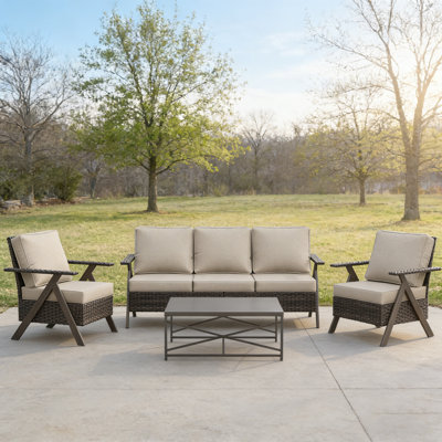 4 Piece Outdoor Wicker Conversation Set With Sofa Two Chairs And Coffee Table Beige Cushions Brown Table