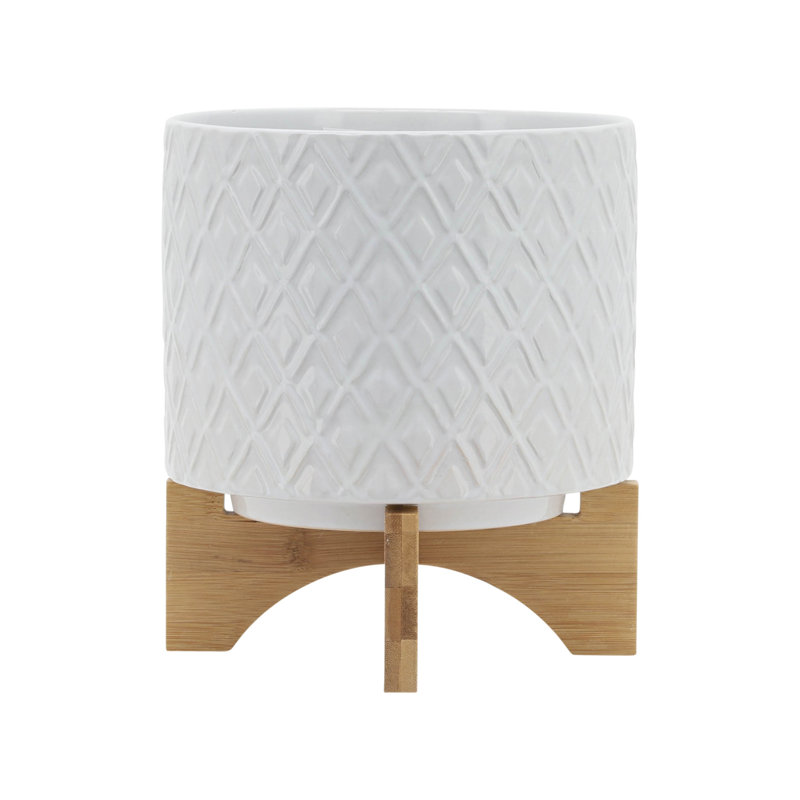 Exquisite Ceramic Planter With Stand, Versatile For Indoor And Outdoor Decor, Enhancing Any Space With Style And Functionality.