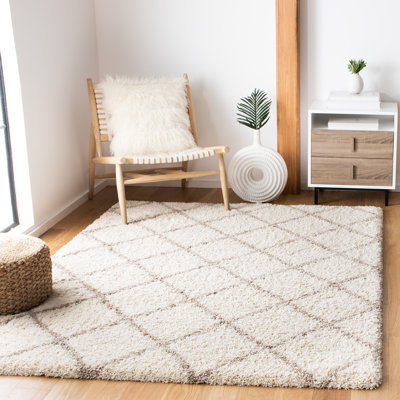 Tapis géométrique beige / ivoire Alcaide