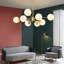 Luminaire suspendu en laiton massif Sputnik