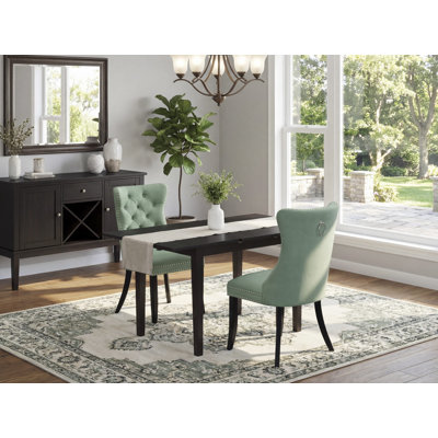 L'ensemble de table de cuisine 3 pièces comprend une table de salle à manger rectangulaire avec rallonge amovible et 2 chaises rembourrées, noir
