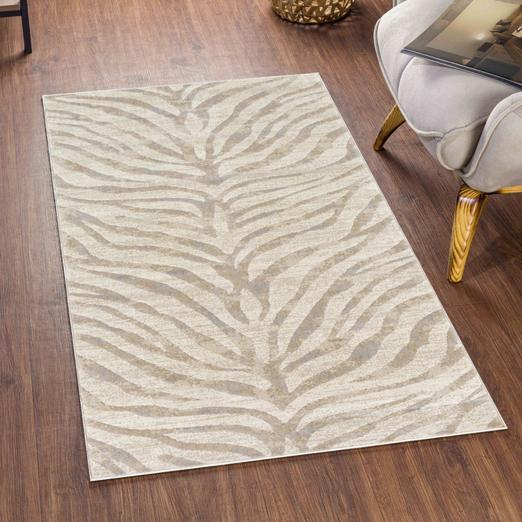 Quamine Animal Print Area Rug