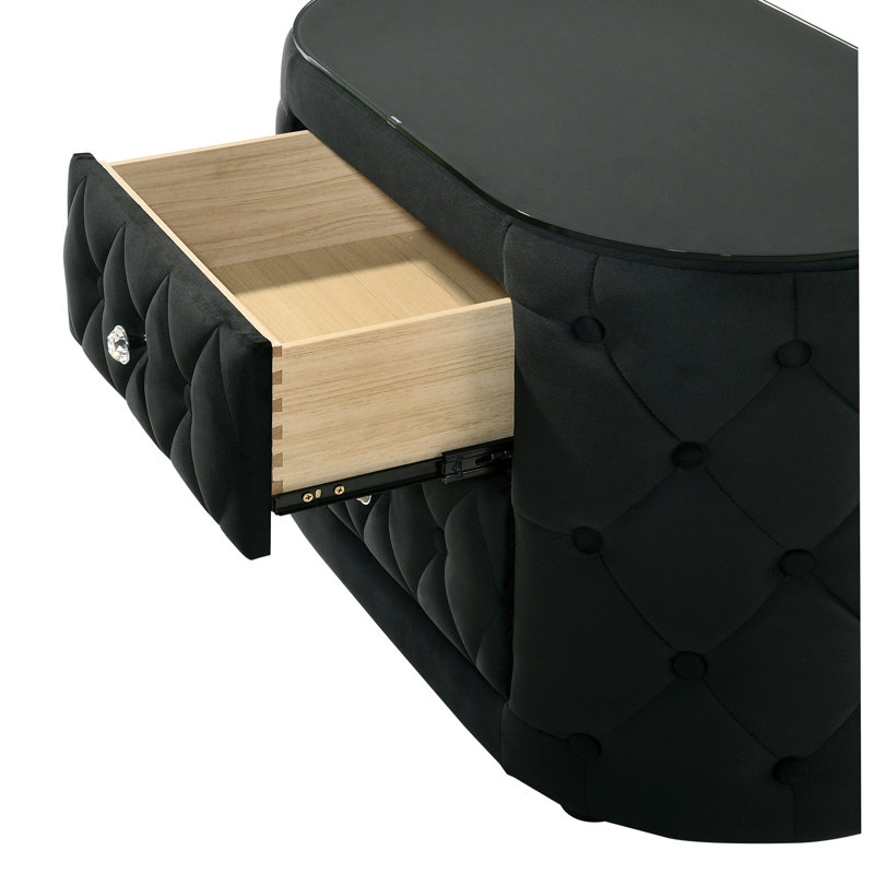 Table de chevet ovale luxueuse avec capitonnage moelleux, plateau en verre trempé, côtés arrondis, tiroirs de rangement et boutons scintillants pour la chambre à coucher