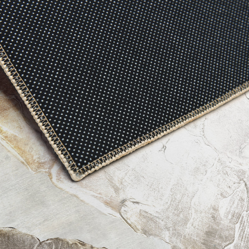 Tapis rectangulaire Divyan avec envers antidérapant