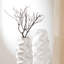 Vase en bois de manguier fabriqué à la main avec un design artisanal et une finition polie lisse pour la décoration intérieure