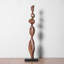 Objet décoratif en bois massif brun et noir