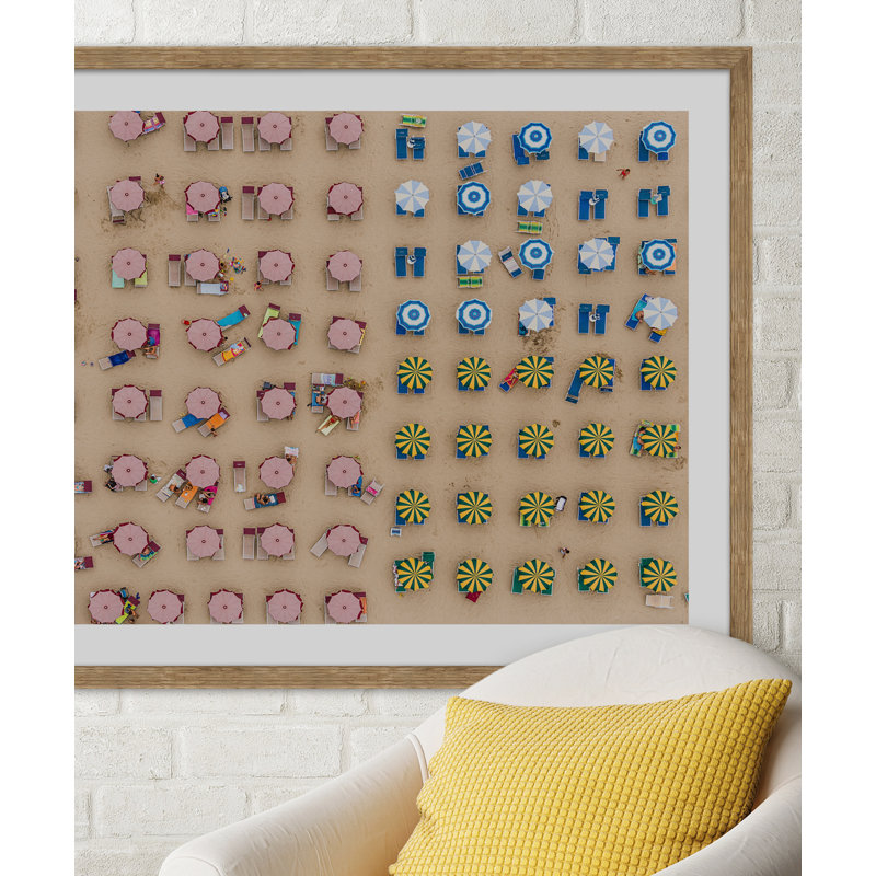 Aerial View Of Sunshades Standing In The Sand Giclee Print by Getty Images, 20" H x 25" W x 1.5" D, Natural