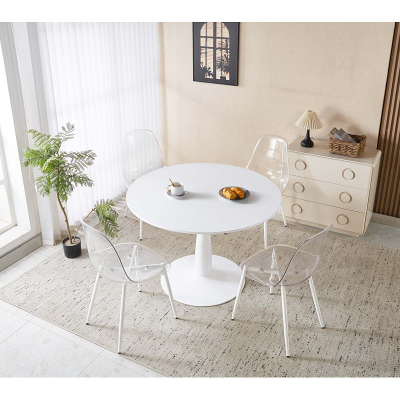 Ensemble de salle à manger 5 pièces avec table à piédestal avec plateau en panneau de fibres à densité moyenne et pieds en métal, plus quatre chaises ergonomiques pour une salle à manger stable, facile à nettoyer et peu encombrante.