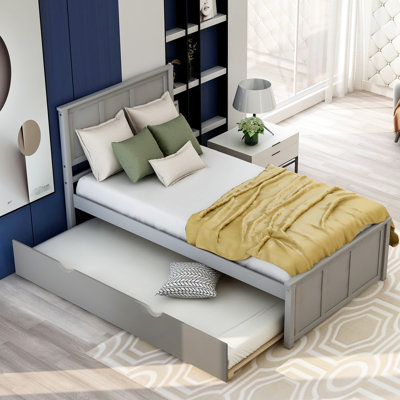 Lit plateforme gris avec lit gigogne amovible