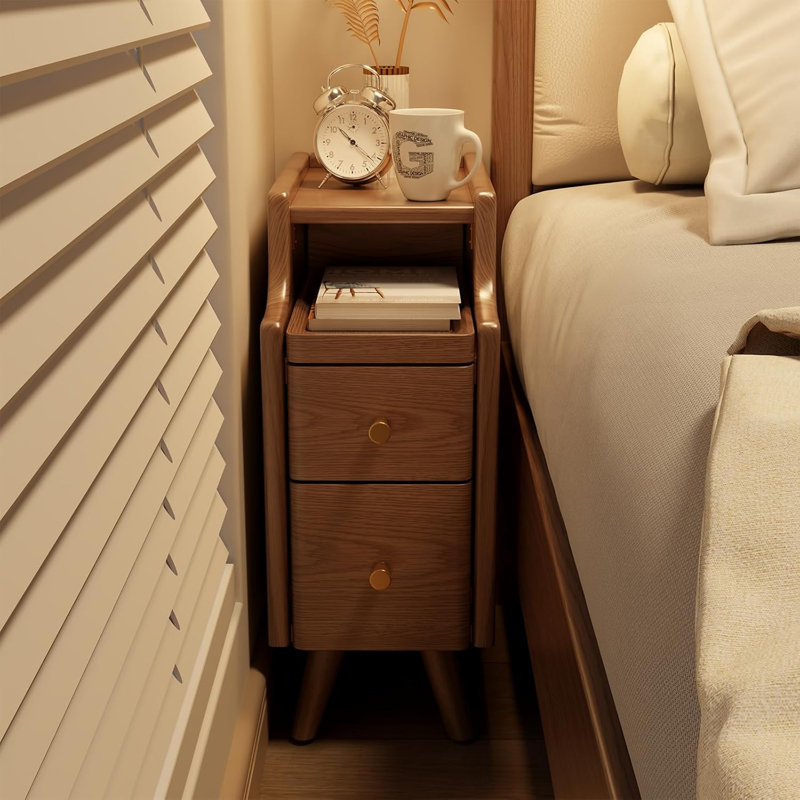 A Small Bedside Table With Drawers