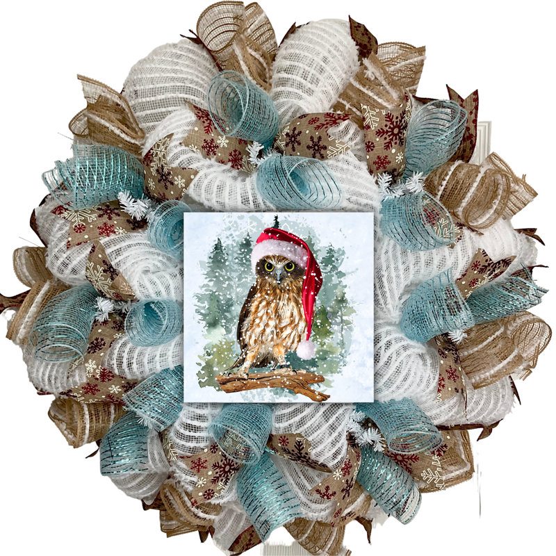 Couronne de Noël avec un chapeau de père Noël