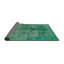 Tapis vert de style oriental-460556763