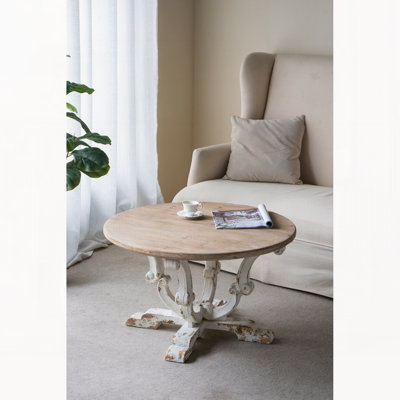Table basse ronde en bois 31,5 x 31,5 x 18,5 po avec finition blanche patinée et pieds à volutes