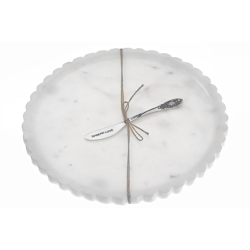 Assiette et épandeur en marbre blanc festonné