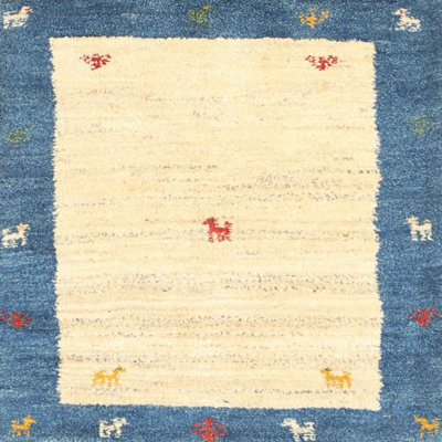 Tapis abstrait beige / bleu