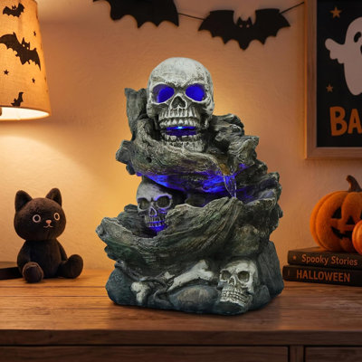 Fontaine de table gothique en forme de crâne, fontaine d'intérieur en résine avec lumières DEL bleues effrayantes, idéale pour la décoration d'Halloween, à poser sur un bureau ou une étagère.