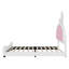Lit plateforme tapissier simple blanc et rose avec tête de lit en forme de lapin