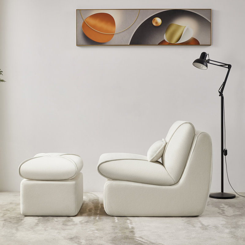 Canapé compact confortable avec repose-pieds pour des espaces de vie polyvalents