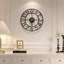 Horloge murale noire pour salon