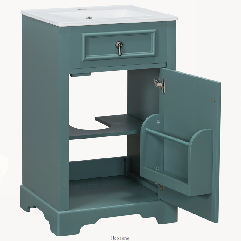 Meuble-lavabo de 50 cm avec lavabo en céramique, porte à fermeture amortie, tablette réglable et tablette de rangement intégrée à la porte.