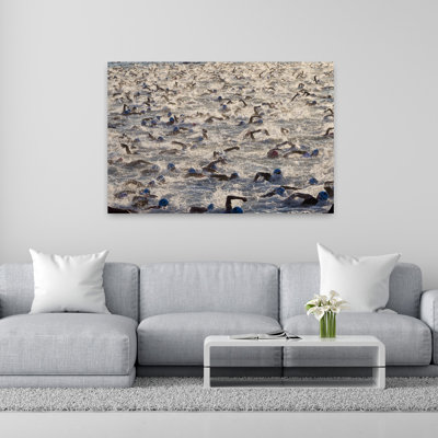 Swimmers Competing In Swim Event Of Ironman Triathlon Kailua Kona Hawaii USA by Alvis Upitis - Wrapped Canvas Print