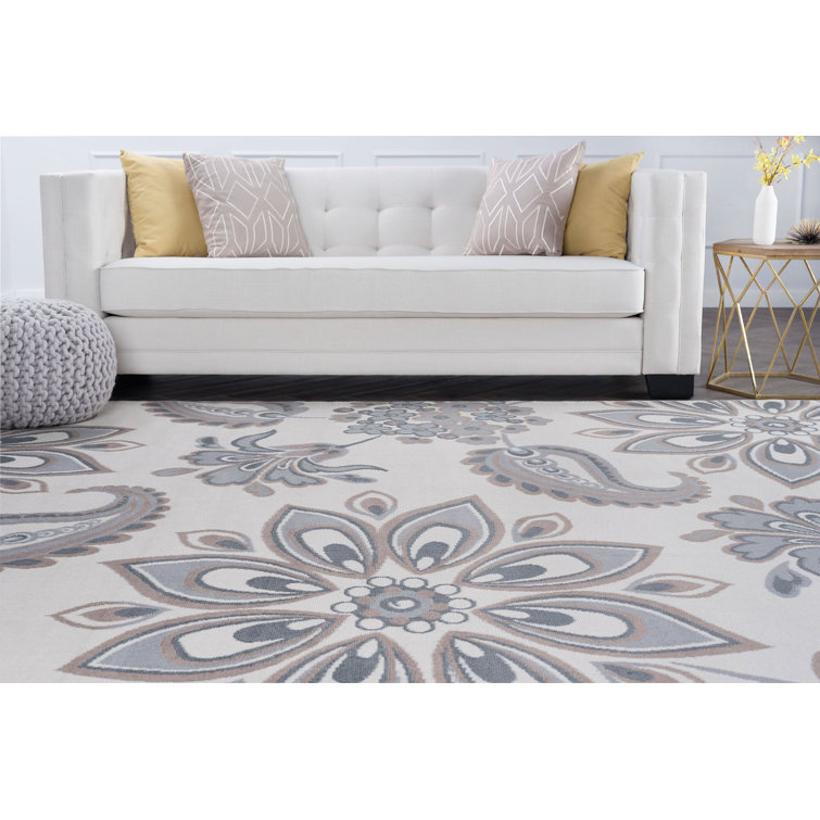 Tapis crème à motif floral transitionnel