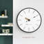 Horloge murale ronde minimaliste blanche à barres