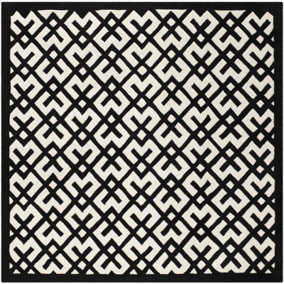 Tapis noir / ivoire en laine touffeté à la main à motif géométrique Teresita Sanaz