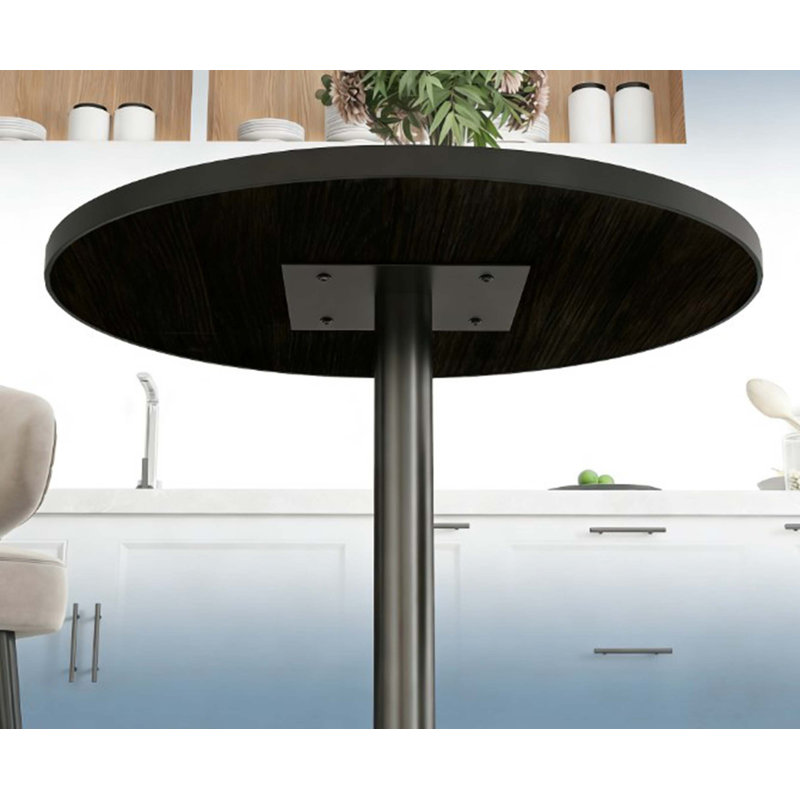 Table de salle à manger ronde moderne pour espaces de vie compacts