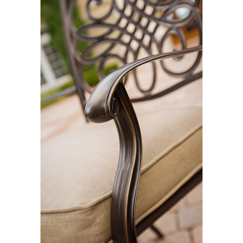 Burroughs 4 - Person Patio Dining Set with Round Table , Cushions Included