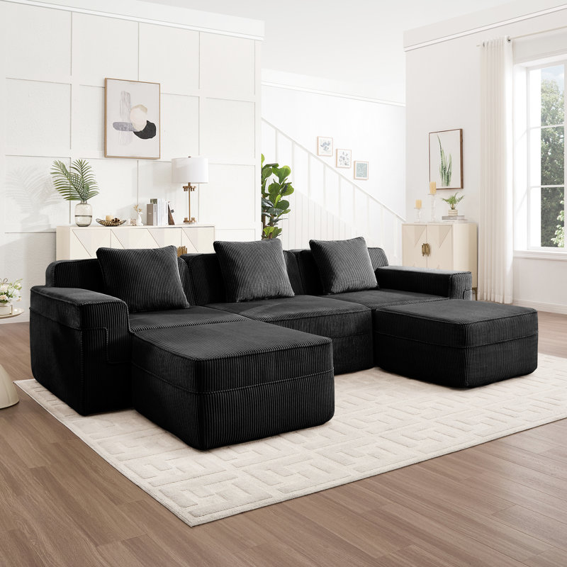 Canapé d'angle modulable 3 places en forme de U, modèle infonuagique sans ossature, avec assise profonde, en velours côtelé noir, sans assemblage, coussins décoratifs moelleux, position allongée relaxante.