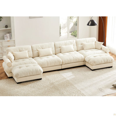 Canapé modulaire en U avec repose-pieds mobile