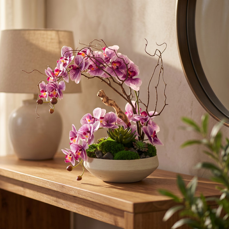 Centre de table organique moderne avec orchidées et plantes grasses