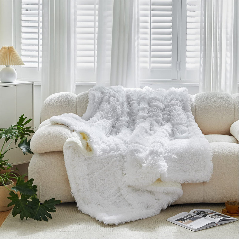 Adai Throw Blanket