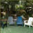 31.5'' Faux Wood Grain Composite Folding Adirondack Chair - With Double Cup Holders-2109373900