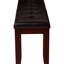 Banc contemporain, siège, pieds fuselés en bois, revêtement, finition rectangulaire, solide et brun cerise pour le salon de la chambre à coucher, siège en similicuir avec capitonnage, fabrication