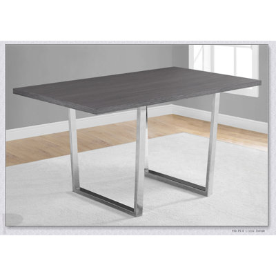 Modern Rectangular Dining Table With Sleek Grey Laminate Top And Chrome Metal Base, For Contemporary Kitchens And Dining Rooms.
