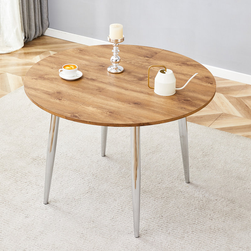 Table de salle à manger extensible ronde avec plateau en bois aggloméré et pieds en métal argenté