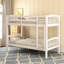 Lit simple au-dessus d'un lit superposé avec espace blanc pour utilisation intensive