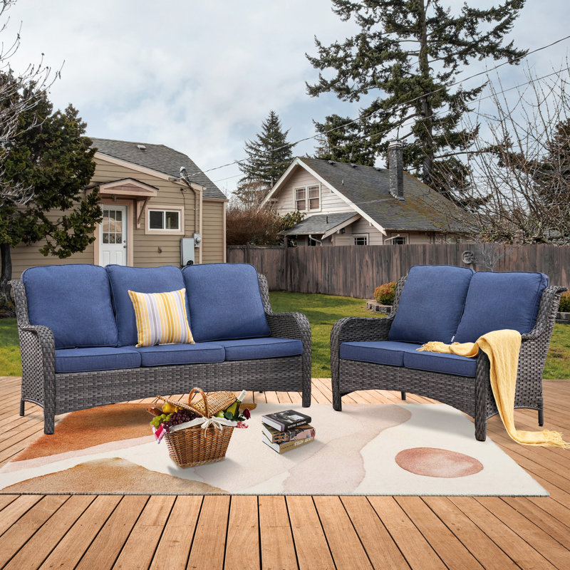 Ensemble de conversation avec canapé en rotin 2 pièces avec coussins Klodjana, Bleu denim, gris
