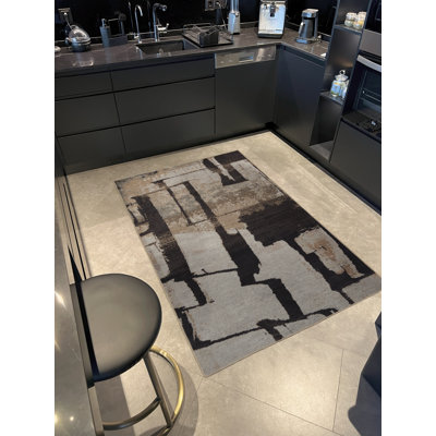Tapis décoratif moderne à motif abstrait noir et beige