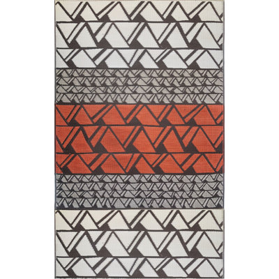 Tapis intérieur / extérieur ivoire / gris / rouille à motif géométrique fait à la main