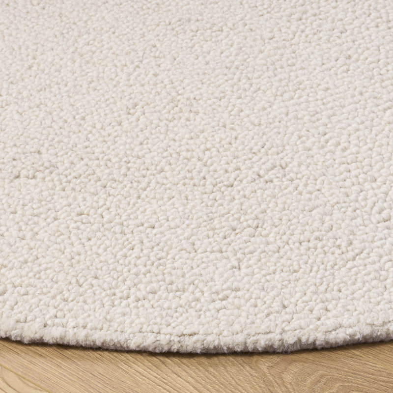 Novelty Hand Tufted Wool & Cotton Solid Color Rug in Ivory, Round 5'