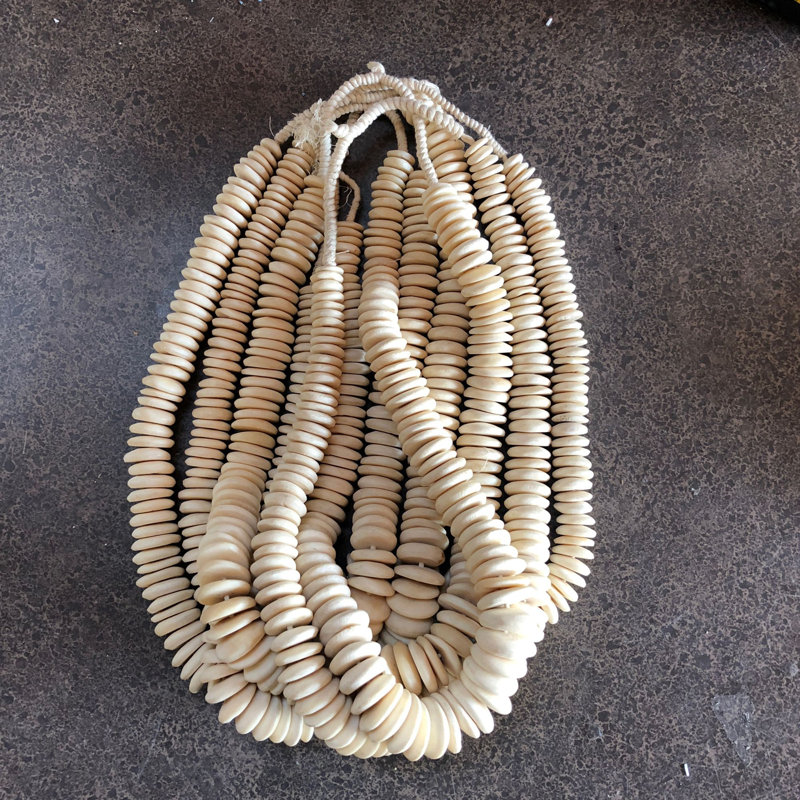 Nigeria Water Buffalo Bone Disk Beads Sculpture