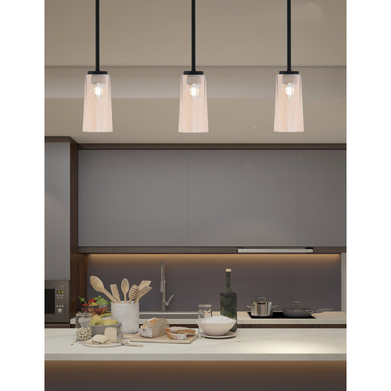 Suspension Arick Stem Hung Mini présentée en finition noir mat avec verre ambré dégradé de 12,7 cm (L) x 24,8 cm (H).