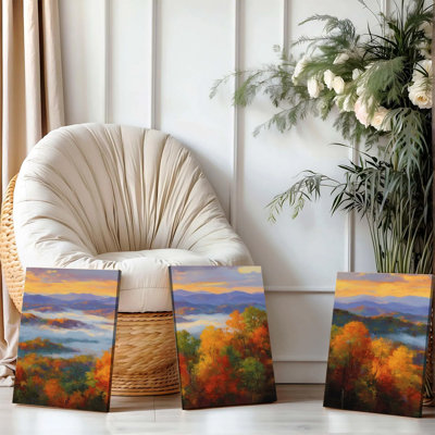 Ensemble de 3 affiches encadrées représentant un paysage de montagne automnal sur toile. Peinture panoramique en trois parties représentant un coucher de soleil avec une vallée brumeuse et des arbres colorés. Décor moderne et naturel pour salon, chambre ou bureau. Toile tendue et prête à être accrochée.