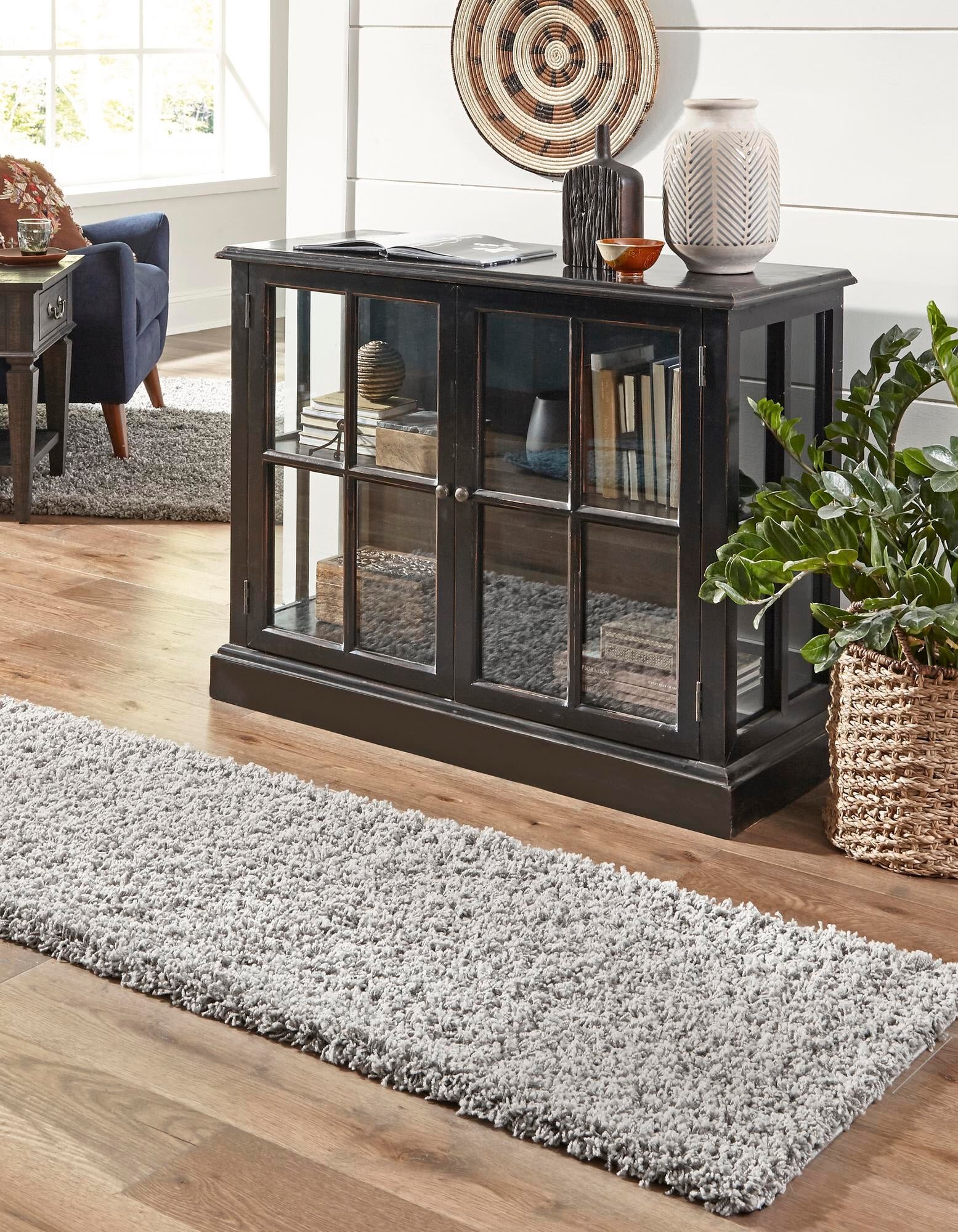 https://assets.wfcdn.com/im/72426132/compr-r85/1957/195776951/santosha-cloud-gray-shag-rug.jpg